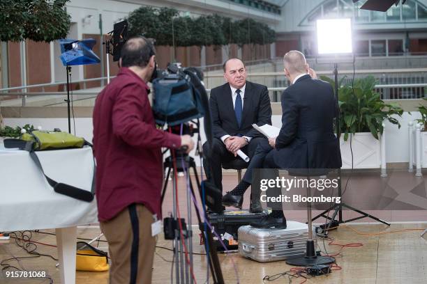 Axel Weber, chairman of UBS Group AG, pauses during a Bloomberg Television interview at the Deutsche Bundesbank European money and finance forum in...