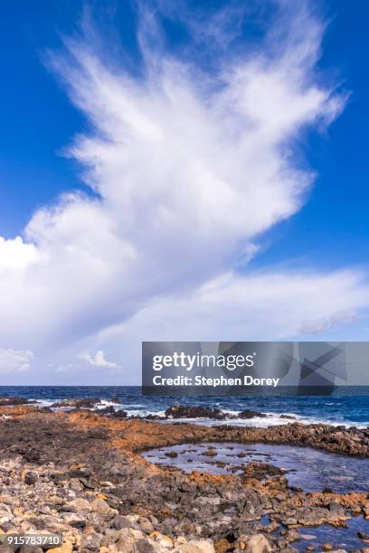 a cloud formation over the atlantic ocean on the canary island of fuerteventura. - caleta de fuste stock-fotos und bilder