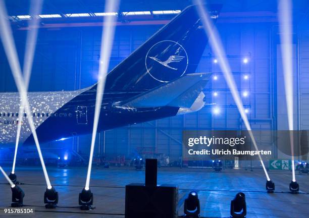 Lufthansa Group event to present the new blue livery on an Lufthansa Jumbo 747-8 at Frankfurt Airport. Tailfin of the machine with Lufthansa logo in...