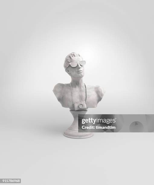 statue of a tourist made of marble - chest or bust foto e immagini stock