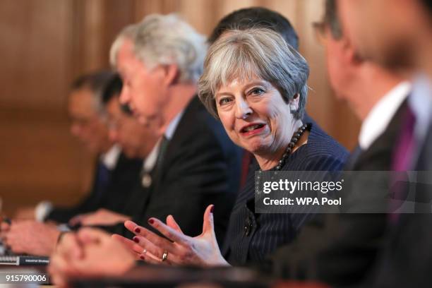 Britain's Prime Minister Theresa May speaks as she hosts a roundtable with Japanese investors in the UK at 10 Downing Street on February 8, 2018 in...