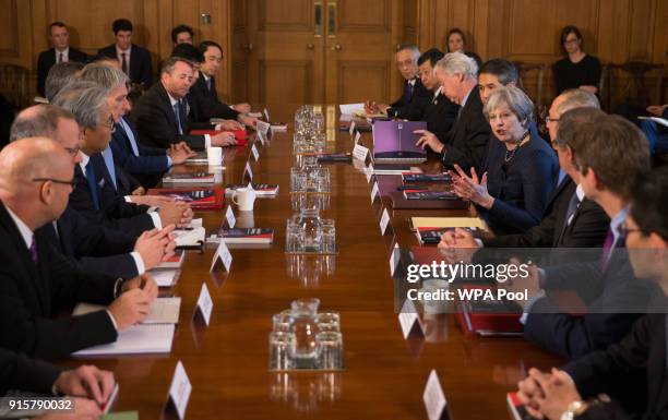 Britain's Prime Minister Theresa May speaks as she hosts a roundtable with Japanese investors in the UK at 10 Downing Street on February 8, 2018 in...