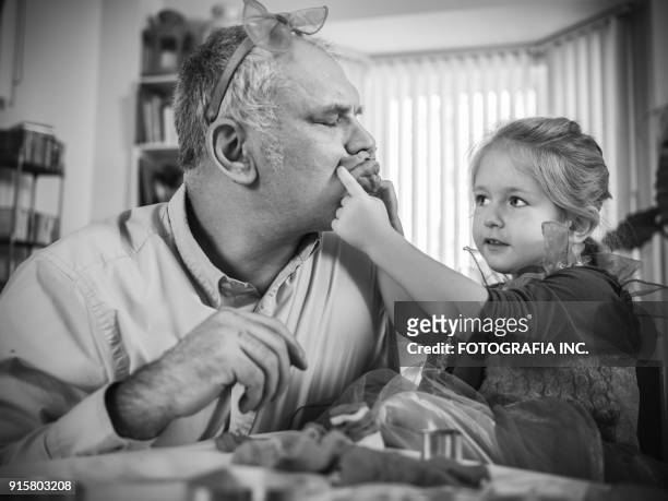 father and daughter crafting - fotografia photos stock pictures, royalty-free photos & images