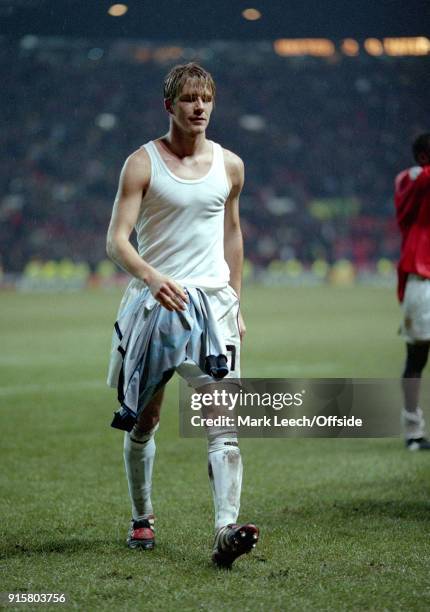 March 1999 Manchester ; UEFA Champions League Manchester United v Internazionale ; David Beckham of United walks from the pitch wearing a vest .