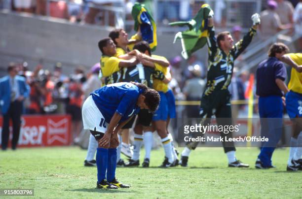 July 1994 Pasadena: FIFA World Cup Final - Brazil v Italy - Roberto Baggio hangs his head after missing the vital penalty during the shootout and...