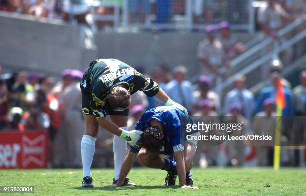 July 1994 Pasadena: FIFA World Cup Final - Brazil v Italy - Brazilian goalkeeper Taffarel consoles Italian captain Franco Baresi after his penalty...