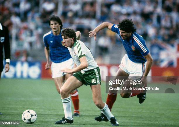 June 1982 Zaragoza: FIFA World Cup - Northern Ireland v Yugoslavia - Norman Whiteside of Northern Ireland in action during the match in which he...