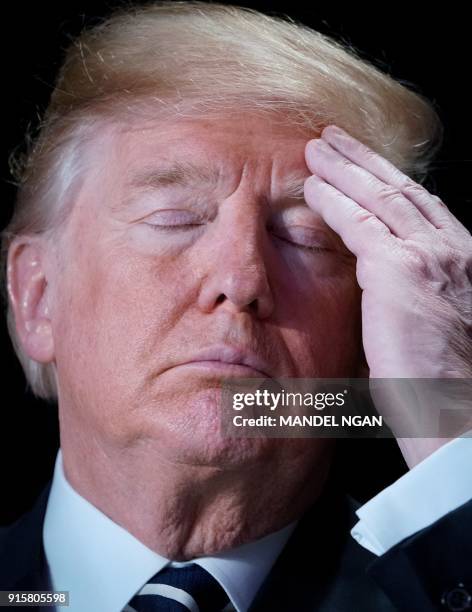 President Donald Trump attends the National Prayer Breakfast at a hotel in Washington, DC on February 8, 2018.