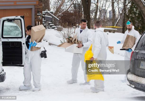 Forensic investiagtors remove evidence from home at 57 Mallory Cresc., Toronto. Planters containing body parts linked to accused serial killer Bruce...