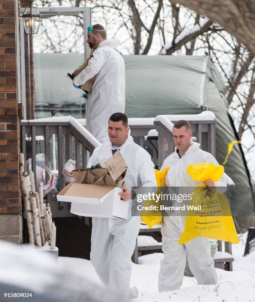 Forensic investigators remove evidence from inside the home at 53 Mallory Cresc., Toronto. Planters containing body parts linked to accused serial...