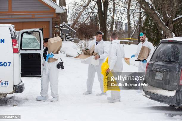 Forensic investigators remove evidence from inside the home at 53 Mallory Cresc., Toronto. Planters containing body parts linked to accused serial...