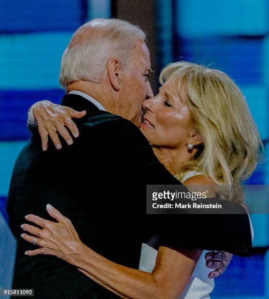 American politician US Vice President Joe Biden and his wife, educator Dr Jill Biden, embrace on the podium during the Democratic National Convention...