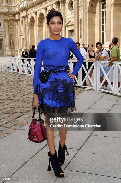 Freida Pinto arrives for the Louis Vuitton Pret a Porter show as part of the Paris Womenswear Fashion Week Spring/Summer 2010 at Cour Carree du...
