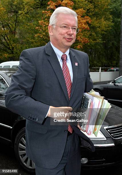 German Christian Democrat and Governor of the state of Hesse Roland Koch arrives for the second round of coalition negotiations between the CDU and...