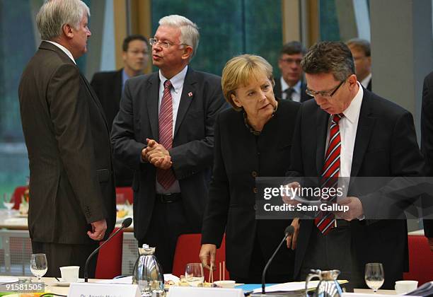 Leader of the Bavarian Christian Democrats Horst Seehofer, Governor of the state of Hesse Roland Koch, German Chancellor and Chairwoman of the German...