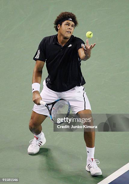 Jo-Wilfried Tsonga of France serves in his match against Richard Gasquet of France during day four of the Rakuten Open Tennis tournament at Ariake...