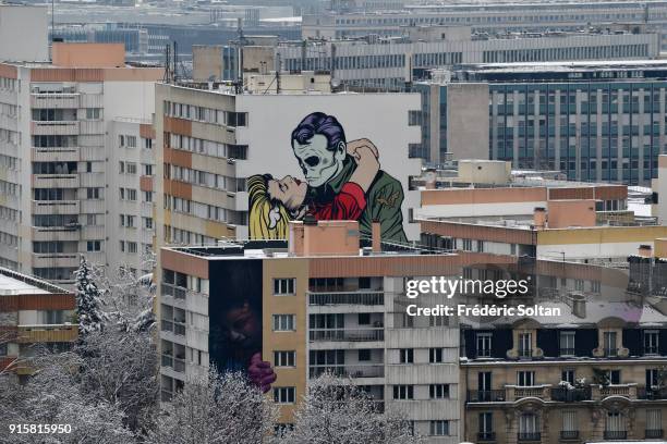 Snowy landscape and mural painting in 13th Paris, HLM district on february 07, 2018 in Paris, France.