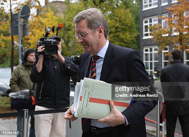 Christian Wulff of the Christian Democratic Union , arrives for the second round of coalition negotiations between the German Free Democrats and the...