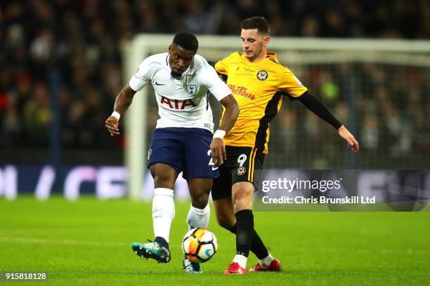 Serge Aurier of Tottenham Hotspur in action with Padraig Amond of Newport County during the Emirates FA Cup Fourth Round Replay between Tottenham...