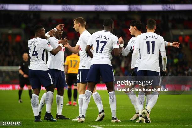 Tottenham Hotspur players celebrate the opening goal during the Emirates FA Cup Fourth Round Replay between Tottenham Hotspur and Newport County at...