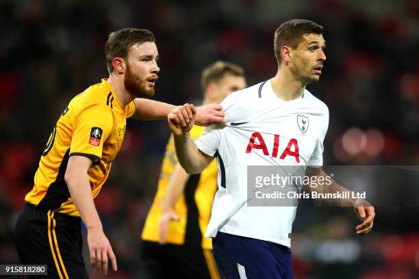 Fernando Llorente of Tottenham Hotspur grapples with Mark O'Brien of Newport County during the Emirates FA Cup Fourth Round Replay between Tottenham...