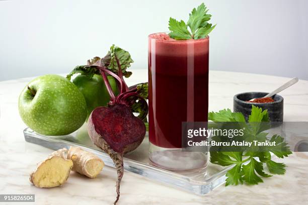 beetroot juice with apples and ginger - beetroot juice stock-fotos und bilder