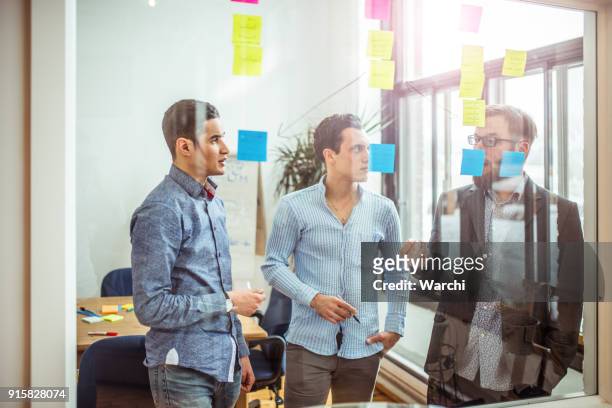 young partners discussing business ideas - workflow efficiency stock pictures, royalty-free photos & images