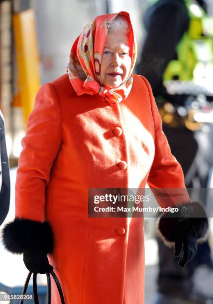 Queen Elizabeth II boards a train at King's Lynn Station to return to London after her Christmas break at Sandringham House on February 7, 2018 in...