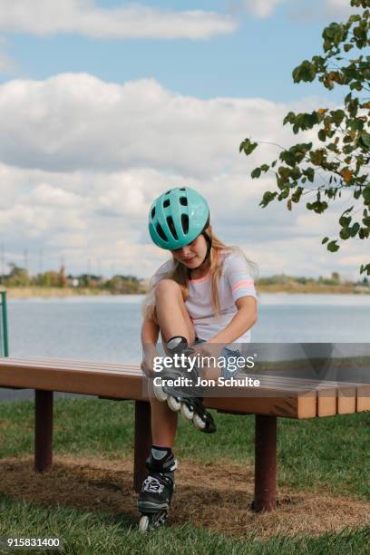 child rollerblading getting ready - west chester, ohio stock pictures, royalty-free photos & images