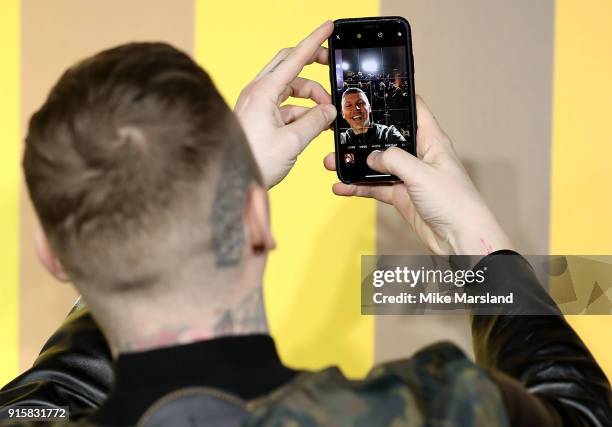 Professor Green takes a selfie as he attends the European Premiere of 'Black Panther' at Eventim Apollo on February 8, 2018 in London, England.