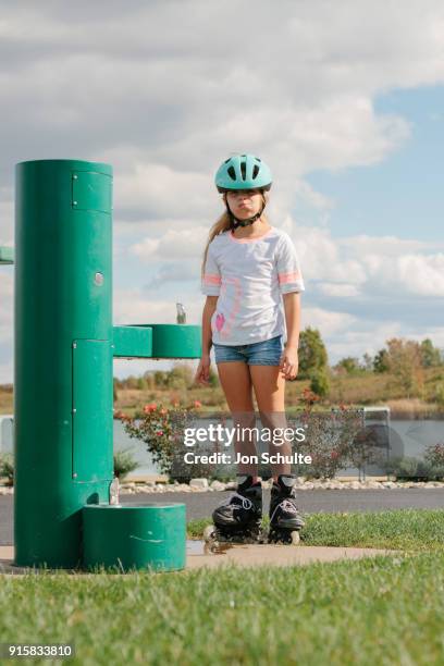 child rollerblading - amusement park ohio stock-fotos und bilder