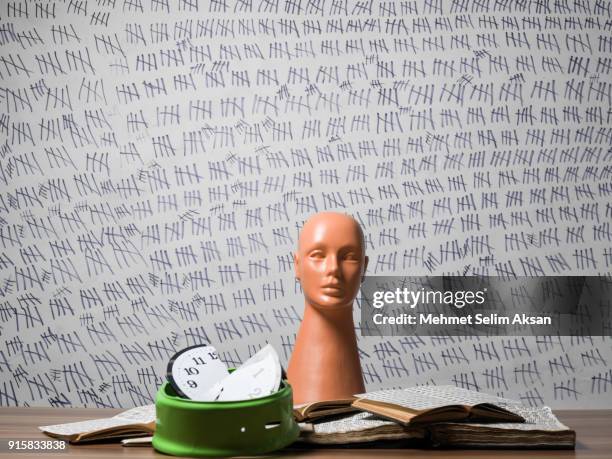 broken clock and plastic mannequin head on desk - broken hourglass stock pictures, royalty-free photos & images