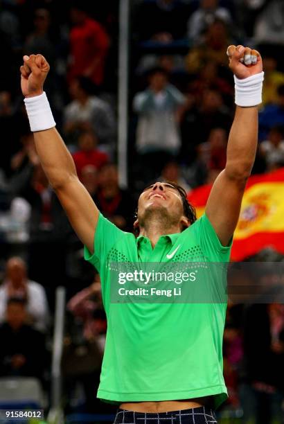 Rafael Nadal of Spain celebrates winning against James Blake of USA in his second round match during day seven of the 2009 China Open at the National...