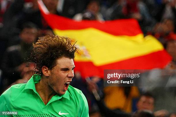 Rafael Nadal of Spain celebrates winning against James Blake of USA in his second round match during day seven of the 2009 China Open at the National...