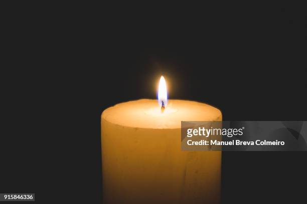 burning candle - memorial candle stock pictures, royalty-free photos & images
