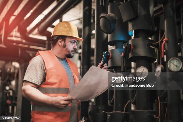 fabriek - water heater stockfoto's en -beelden