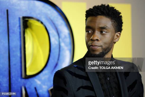 American actor Chadwick Boseman poses on arrival for the European Premiere of 'Black Panther' in central London on February 8, 2018.