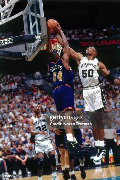 Rodney Rogers of the Denver Nuggets dunks during Game One of the First Round of the 1995 NBA Playoffs played on April 28, 1995 at the Alamo Dome in...