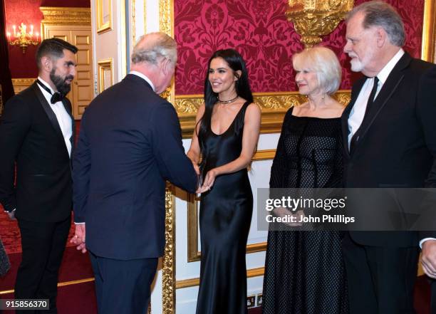 Prince Charles, Prince of Wales meets singer Cheryl Tweedy, actress Dame Helen Mirren and director Taylor Hackford as he attends the Prince’s Trust...