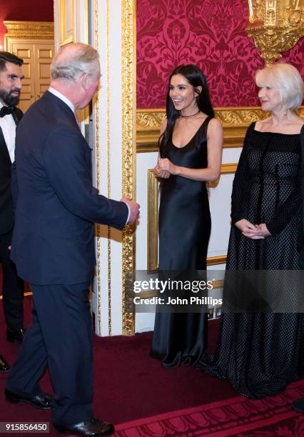 Prince Charles, Prince of Wales meets singer Cheryl Tweedy and actress Dame Helen Mirren as he attends the Prince’s Trust 'Invest in Futures'...