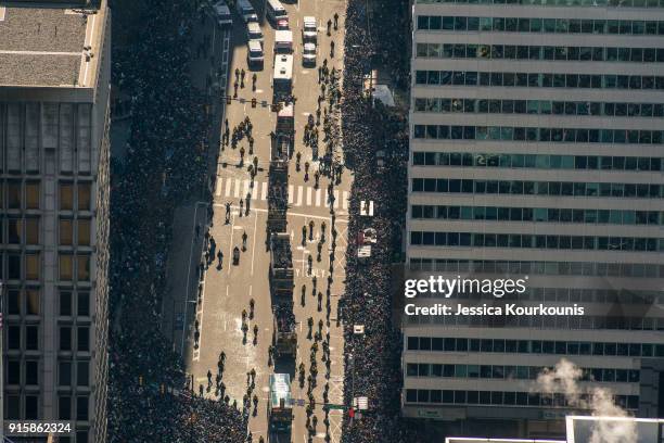 Fans crowd the streets to watch a Super Bowl victory parade for the Philadelphia Eagles NFL football team on February 8, 2018 in Philadelphia,...