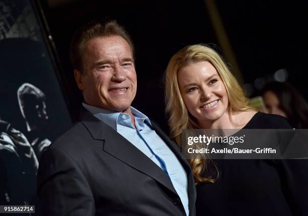 Actor Arnold Schwarzenegger and Heather Milligan attend the premiere of 'The 15:17 To Paris' at Warner Bros. Studios on February 5, 2018 in Burbank,...