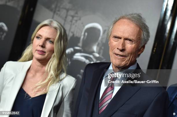 Director Clint Eastwood and Christina Sandera attend the premiere of 'The 15:17 To Paris' at Warner Bros. Studios on February 5, 2018 in Burbank,...