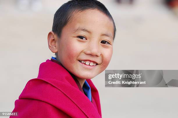 smiling little monk - tibetansk buddhism bildbanksfoton och bilder