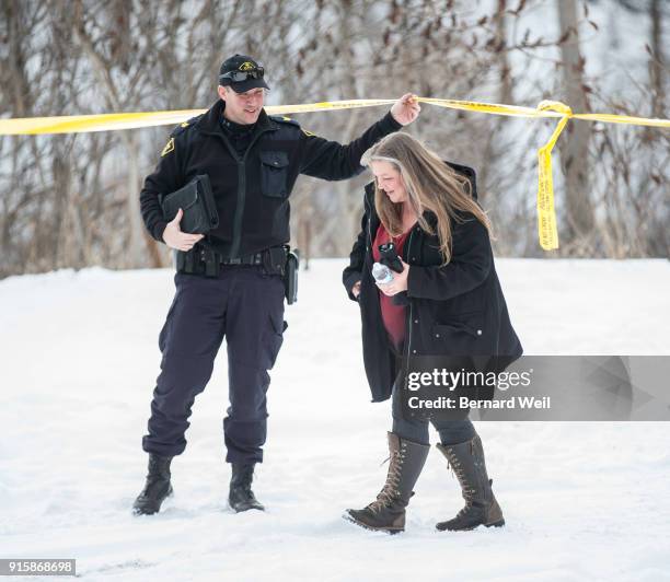 Forensic anthropologist Kathy Gruspier is escorted to the home at 53 Mallory Cresc., where investigators removed evidence from inside the home at 53...