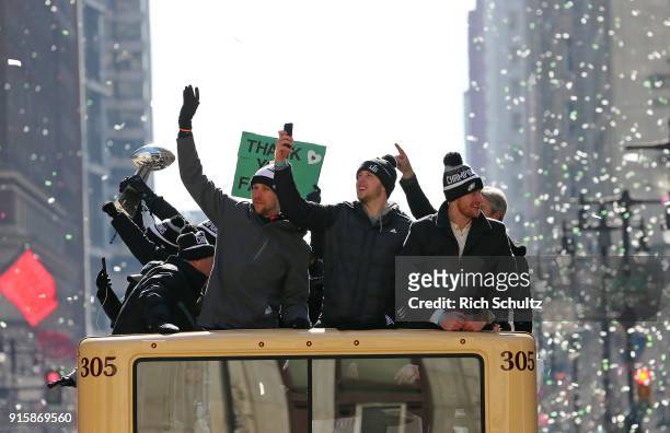 Quarterback Nick Foles of the Philadelphia Eagles, left, waves, during their Super Bowl Victory Parade on February 8, 2018 in Philadelphia,...