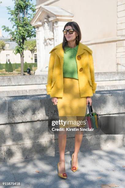 Senior Fashion Editor at Vogue Japan Giovanna Battaglia Engelbert wears a Prada jacket, skirt and top, Sara Battaglia bag and Manolo Blahnik shoes...