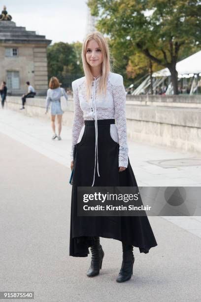 Fashion blogger Charlotte Groeneveld of The Fashion Guitar wears a Nina Ricci top, skirt and boots day 4 of Paris Womens Fashion Week Spring/Summer...