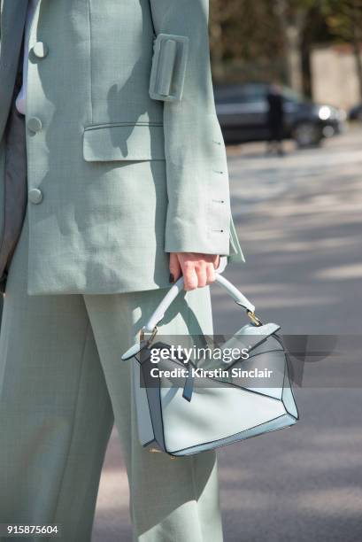 Fashion Director at Costume Magazine Denmark Thora Valdimars wears a Rodebjer suit and a Loewe bag day 4 of Paris Womens Fashion Week Spring/Summer...