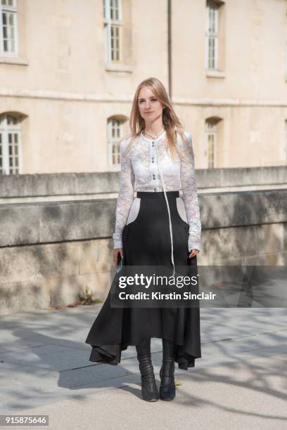 Fashion blogger Charlotte Groeneveld of The Fashion Guitar wears a Nina Ricci top, skirt and boots day 4 of Paris Womens Fashion Week Spring/Summer...